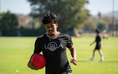 A student playing dodgeball
