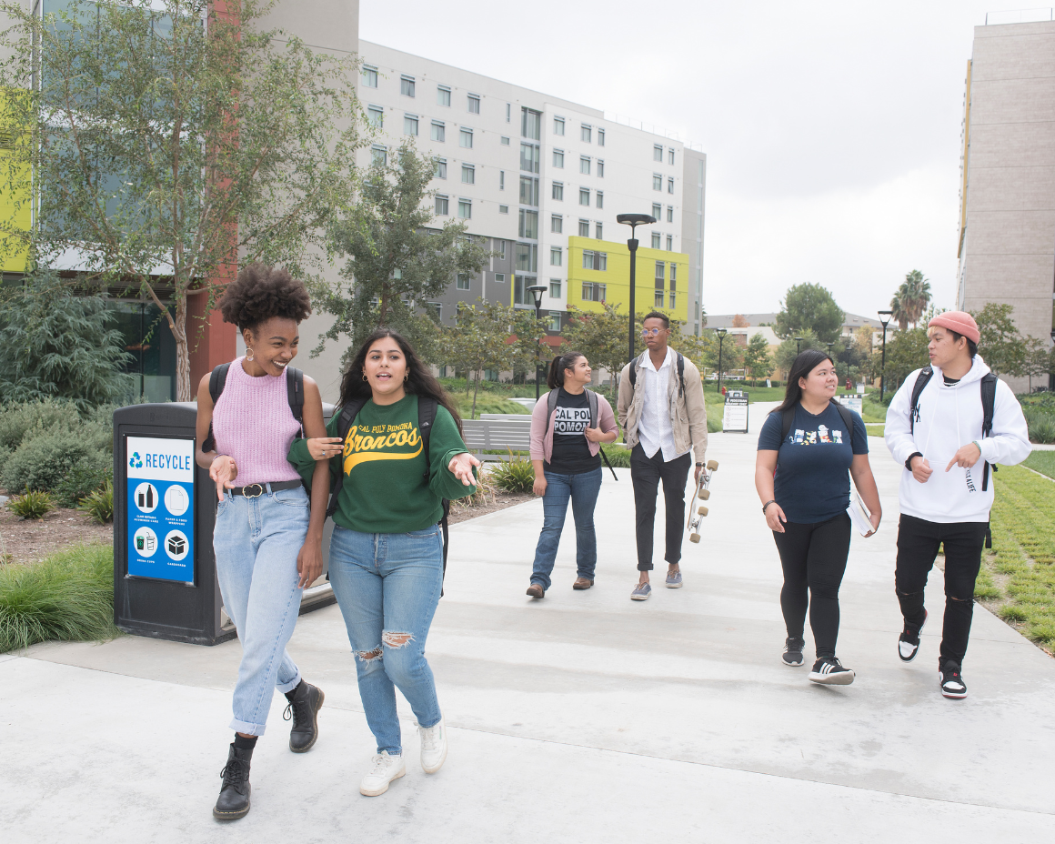 students walk together near the residence halls