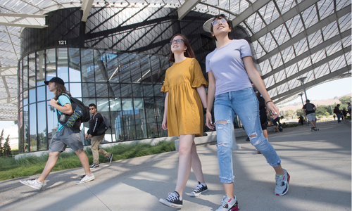 Clarissa Castro and Willow Lance walk past the SSB 